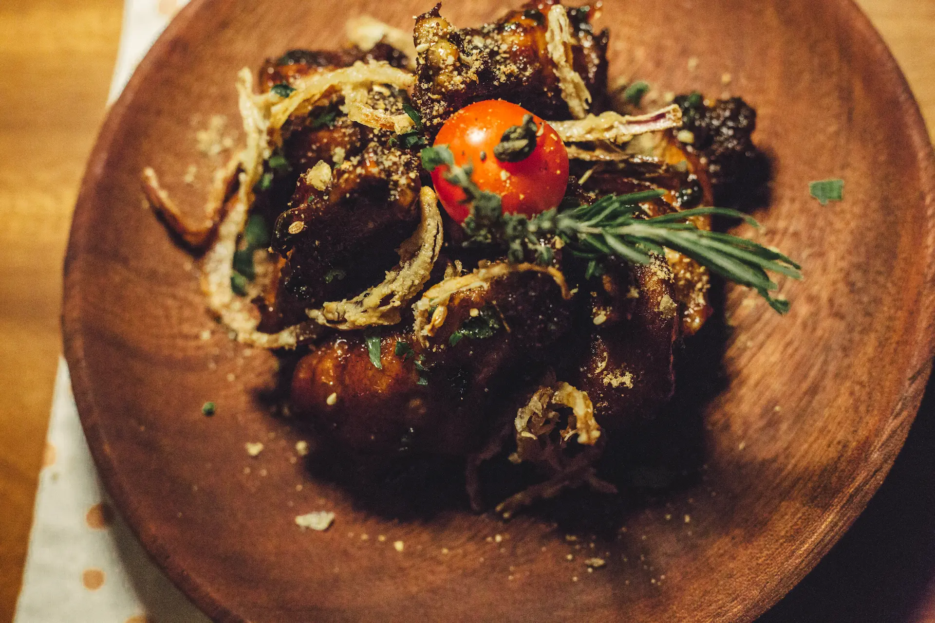 Glazed braised short ribs with crispy onions