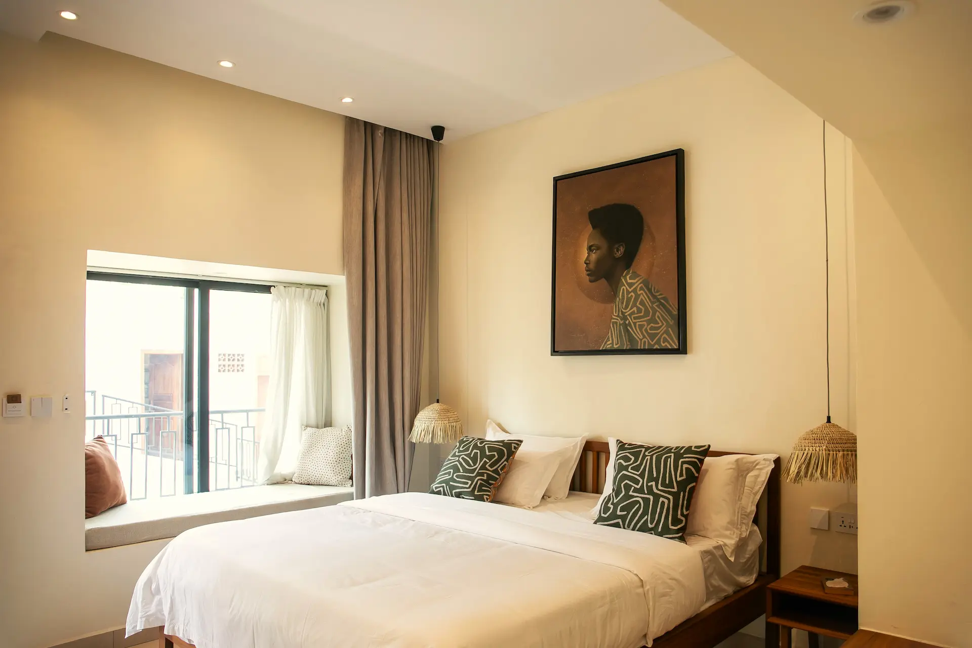 Adventurer room with panoramic window seat and balcony view