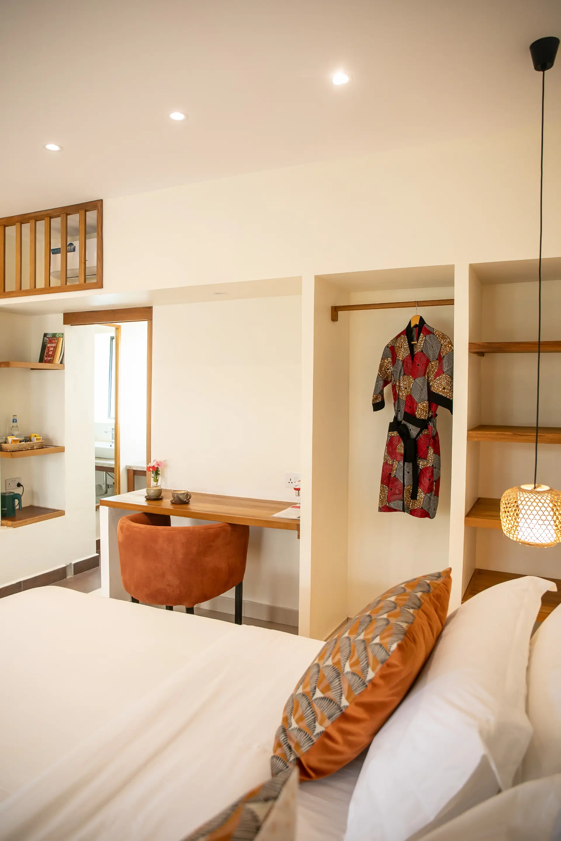 Meditator room â€” double bed, wardrobe and en-suite view